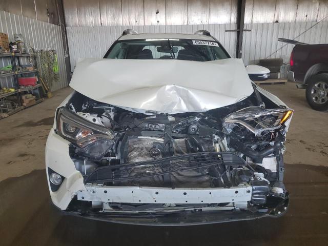 Photo 5 from auction – 2018 TOYOTA RAV4 LIMIT with VIN 2T3DFREV8JW748047