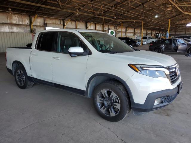 Photo 4 from auction – 2019 HONDA RIDGELINE with VIN 5FPYK3F64KB017969