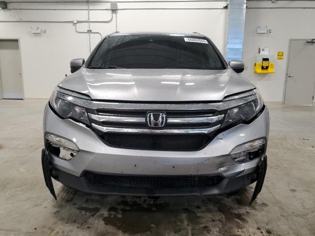 Photo 5 from auction – 2016 HONDA PILOT EXL with VIN 5FNYF6H89GB505061
