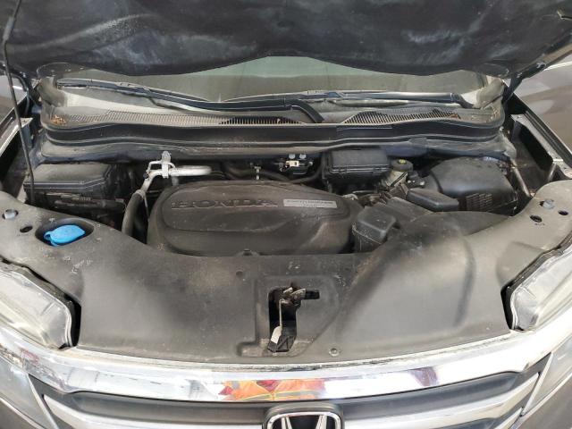 Photo 12 from auction – 2018 HONDA PILOT LX with VIN 5FNYF5H15JB016953