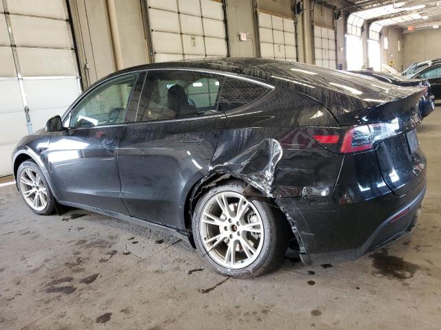 Снимка 2 от търг – 2023 TESLA MODEL Y с VIN 7SAYGAEE0PF907838
