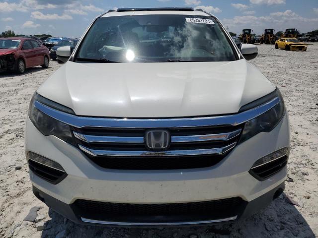 Photo 5 from auction – 2017 HONDA PILOT TOUR with VIN 5FNYF5H99HB017507
