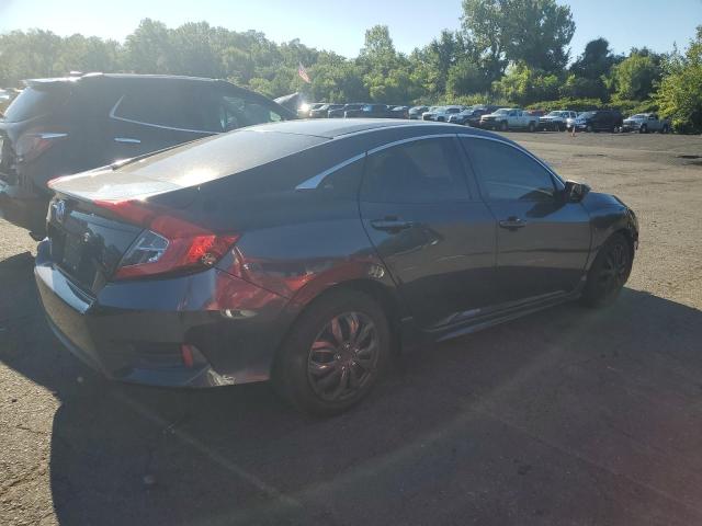 Photo 3 from auction – 2018 HONDA CIVIC LX with VIN 2HGFC2F50JH534629