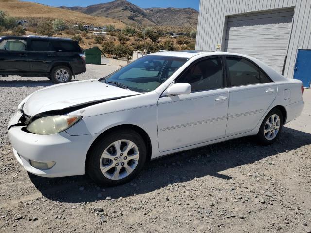 TOYOTA CAMRY LE 2005 with VIN 4T1BF32K65U604977 - Photo from auction