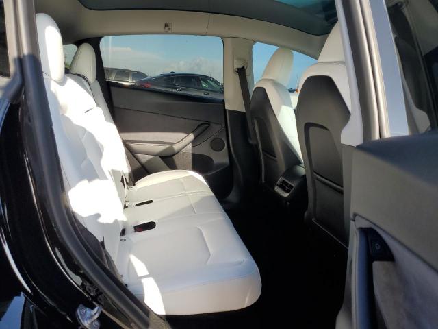 Photo 10 from auction – 2023 TESLA MODEL Y with VIN 7SAYGDEE6PF894725