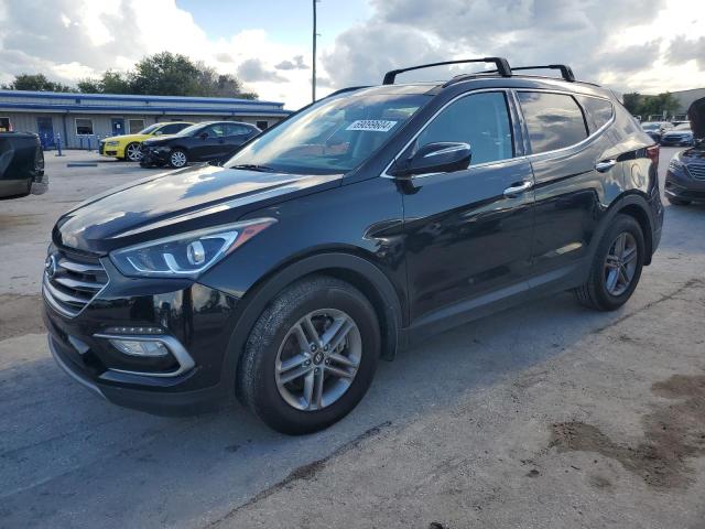 HYUNDAI SANTA FE S 2018 with VIN 5NMZU3LB7JH078352 - Photo from auction
