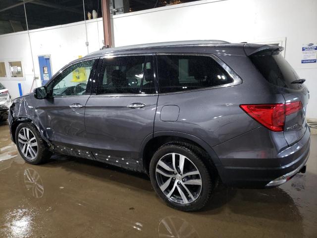 Photo 2 from auction – 2018 HONDA PILOT TOUR with VIN 5FNYF6H94JB033562