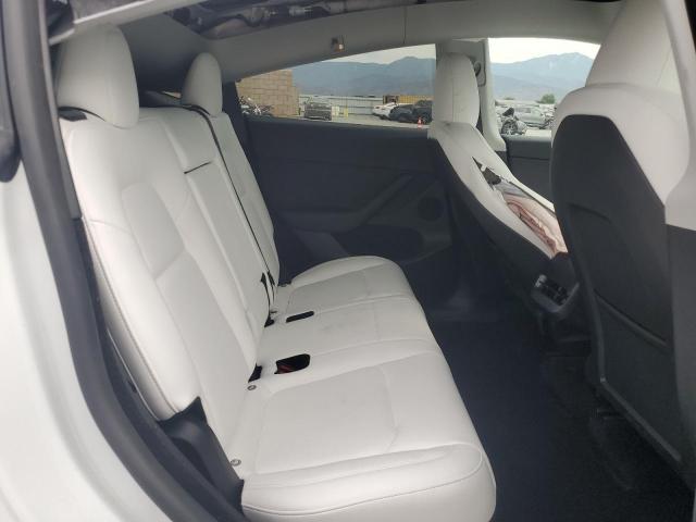 Photo 11 from auction – 2023 TESLA MODEL Y with VIN 7SAYGDED7PF960142
