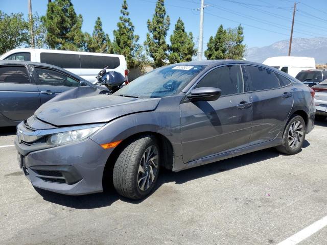 HONDA CIVIC EX 2018 with VIN 2HGFC2F77JH599978 - Photo from auction