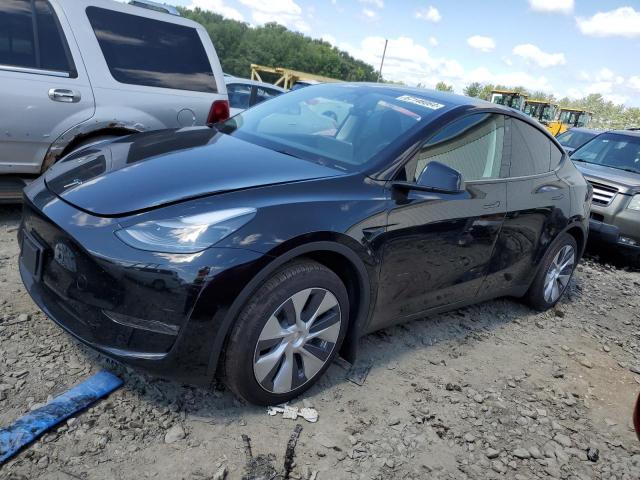 TESLA MODEL Y 2023 with VIN 7SAYGDEE2PF759693 - Photo from auction
