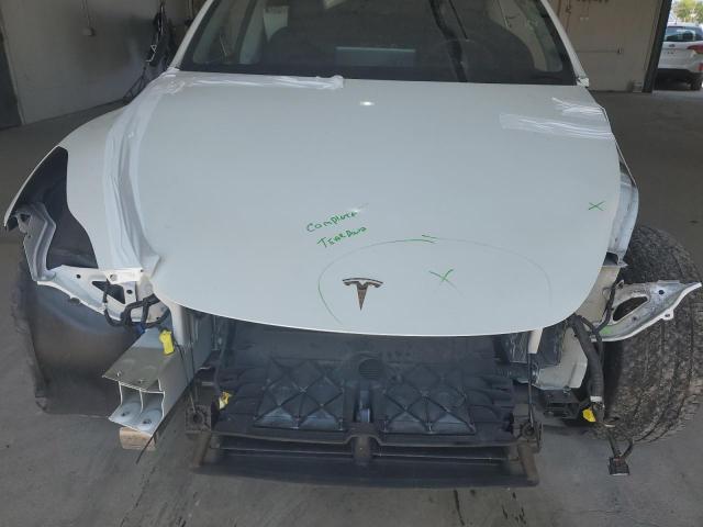 Photo 11 from auction – 2023 TESLA MODEL Y with VIN 7SAYGDEEXPF823348