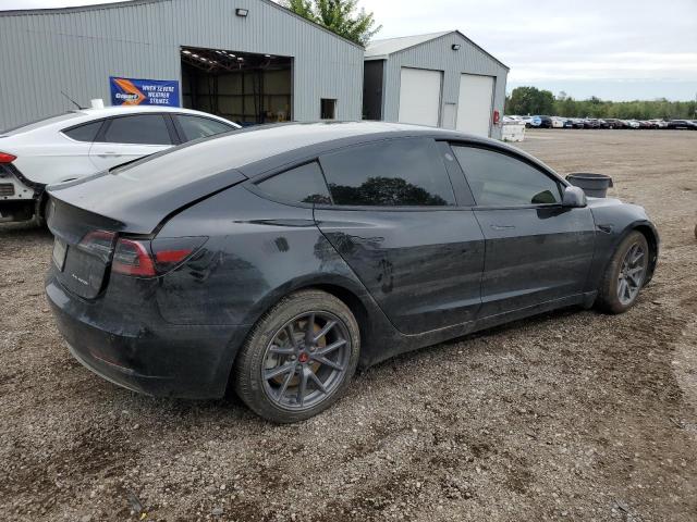Photo 3 from auction – 2022 TESLA MODEL 3 with VIN 5YJ3E1EB2NF335770