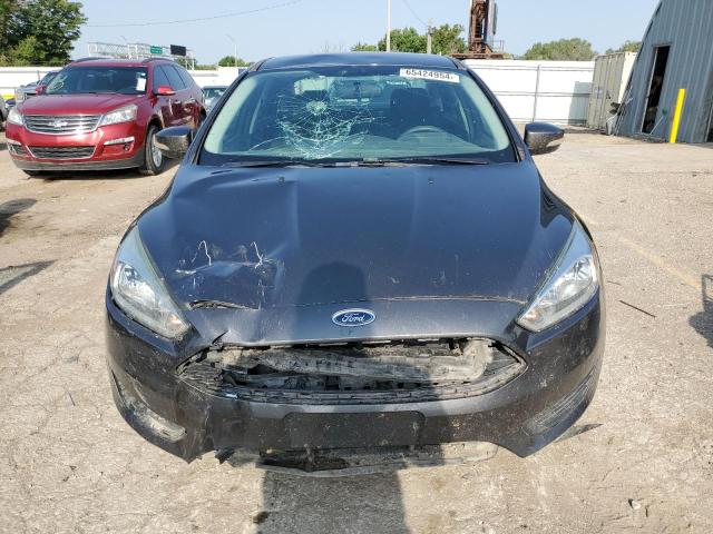 Photo 5 from auction – 2015 FORD FOCUS SE with VIN 1FADP3F22FL370287