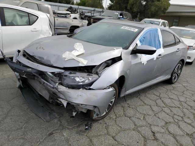 HONDA CIVIC EX 2016 with VIN 2HGFC1F3XGH646677 - Photo from auction