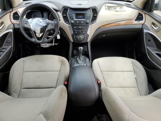 Photo 8 from auction – 2014 HYUNDAI SANTA FE S with VIN 5XYZU3LB4EG213903