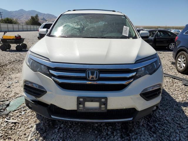 Photo 5 from auction – 2017 HONDA PILOT TOUR with VIN 5FNYF6H98HB042033