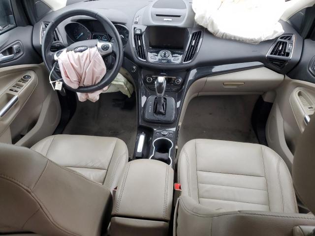 Photo 8 from auction – 2014 FORD ESCAPE TIT with VIN 1FMCU0J97EUE57656