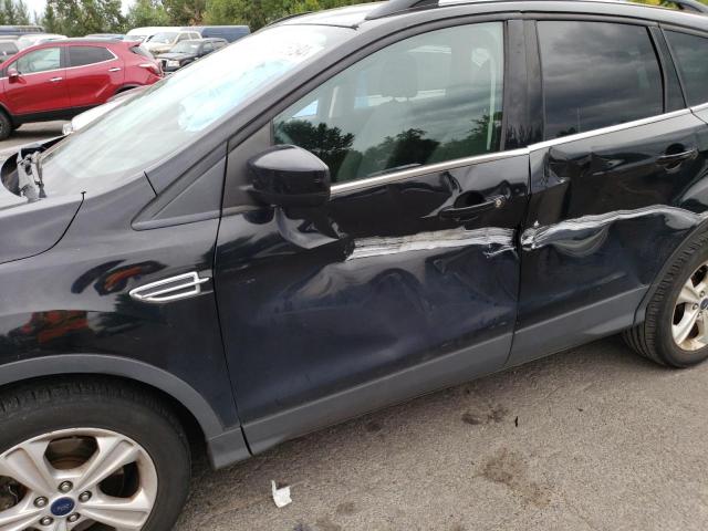 Photo 7 from auction – 2016 FORD ESCAPE SE with VIN 1FMCU9GX0GUB46695
