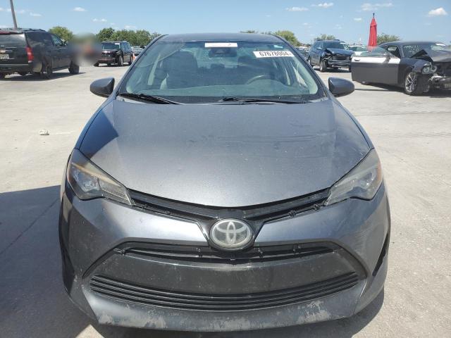 Photo 5 from auction – 2017 TOYOTA COROLLA L with VIN 5YFBURHE0HP647744