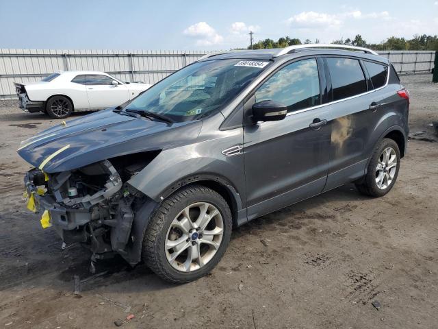 FORD ESCAPE TIT 2016 with VIN 1FMCU9J90GUB90609 - Photo from auction