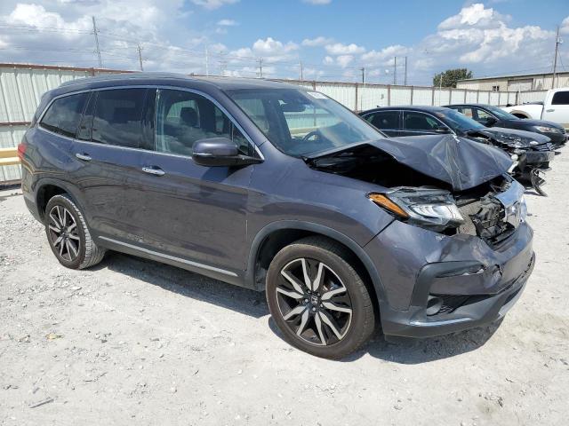 Photo 4 from auction – 2021 HONDA PILOT ELIT with VIN 5FNYF6H05MB057858