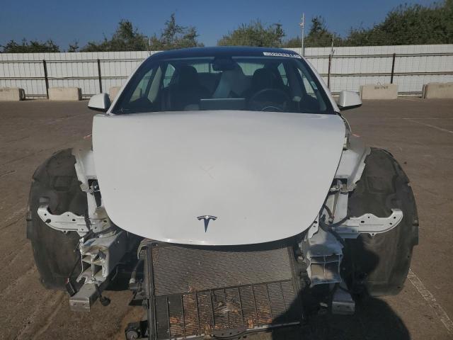 Photo 5 from auction – 2022 TESLA MODEL 3 with VIN 5YJ3E1EA7NF369565