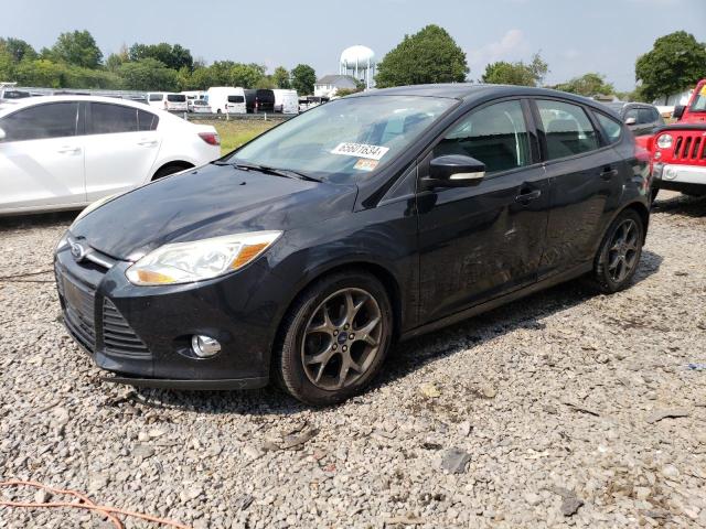 FORD FOCUS SE 2014 with VIN 1FADP3K21EL285140 - Photo from auction