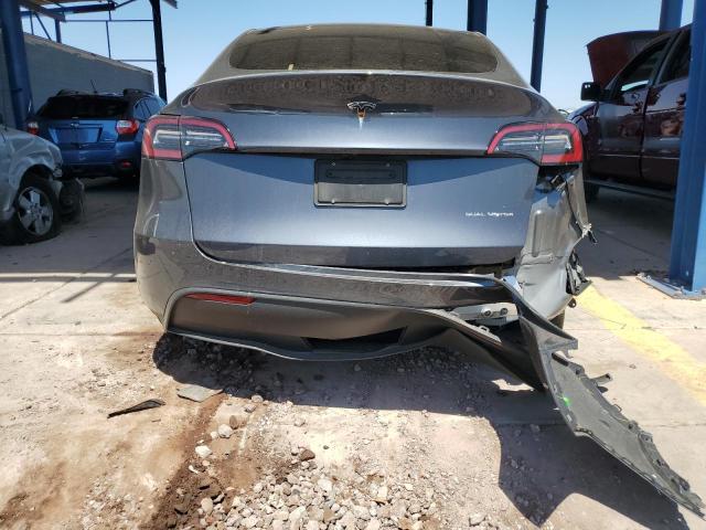 Photo 6 from auction – 2023 TESLA MODEL Y with VIN 7SAYGAEE4PF832044