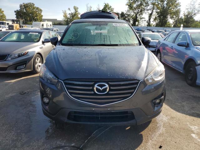Photo 5 from auction – 2016 MAZDA CX-5 TOURI with VIN JM3KE2CY3G0847037