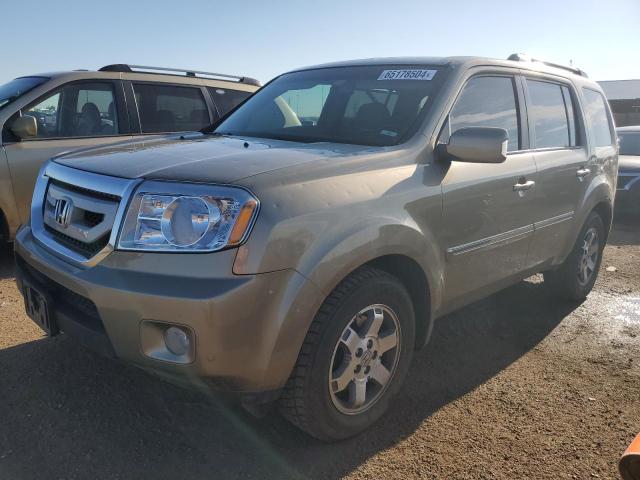 HONDA PILOT TOUR 2010 with VIN 5FNYF4H9XAB022716 - Photo from auction