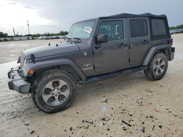 JEEP WRANGLER U 2016 with VIN 1C4BJWEG7GL338003 - Photo from auction