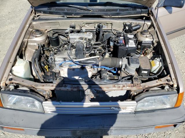 Photo 11 from auction – 1989 MAZDA 323 with VIN JM1BF2329K0392124