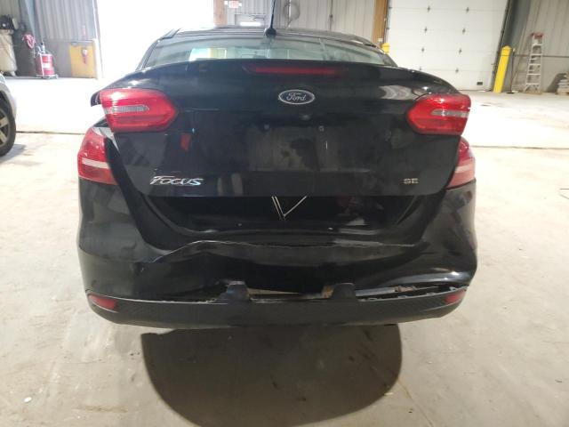 Photo 6 from auction – 2018 FORD FOCUS SE with VIN 1FADP3F22JL257108