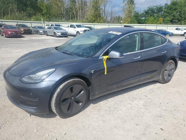 TESLA MODEL 3 2019 with VIN 5YJ3E1EB3KF205671 - Photo from auction