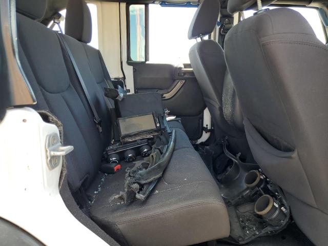Photo 10 from auction – 2011 JEEP WRANGLER U with VIN 1J4BA3H12BL610465