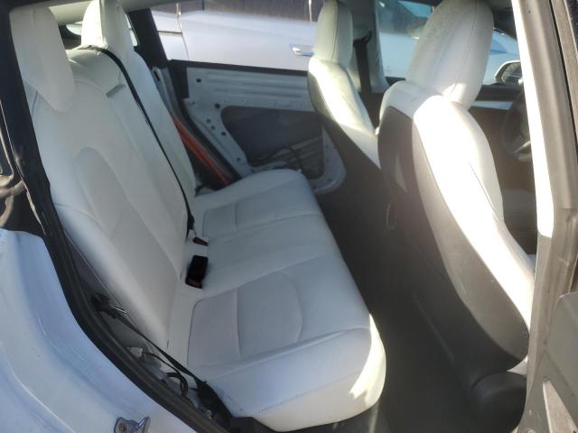 Photo 10 from auction – 2021 TESLA MODEL 3 with VIN 5YJ3E1EB3MF975484