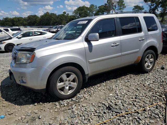HONDA PILOT EXL 2011 with VIN 5FNYF3H58BB023727 - Photo from auction