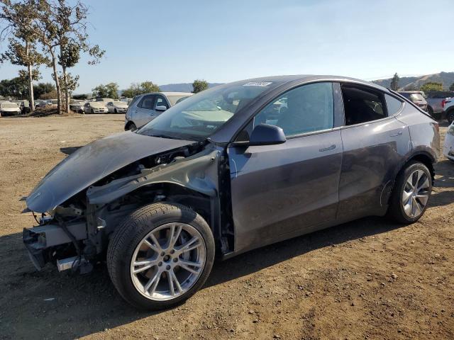 TESLA MODEL Y 2022 with VIN 7SAYGAEE3NF393657 - Photo from auction