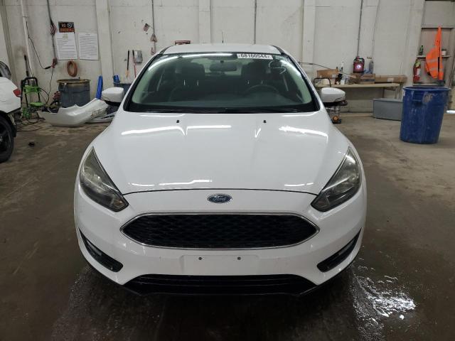 Photo 5 from auction – 2016 FORD FOCUS SE with VIN 1FADP3K20GL384700