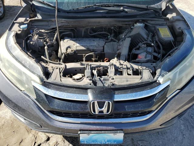 Photo 12 from auction – 2015 HONDA CR-V LX with VIN 2HKRM4H35FH684220
