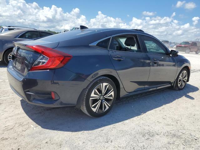 Photo 3 from auction – 2018 HONDA CIVIC with VIN JHMFC1F39JX003057