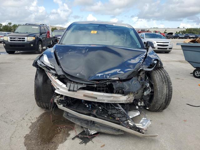 Photo 5 from auction – 2023 TESLA MODEL 3 with VIN 5YJ3E1EC6PF515197
