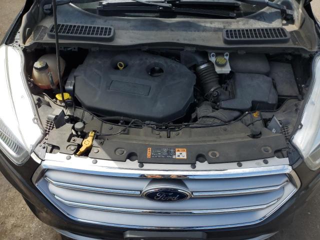Photo 11 from auction – 2017 FORD ESCAPE SE with VIN 1FMCU9G90HUA50407