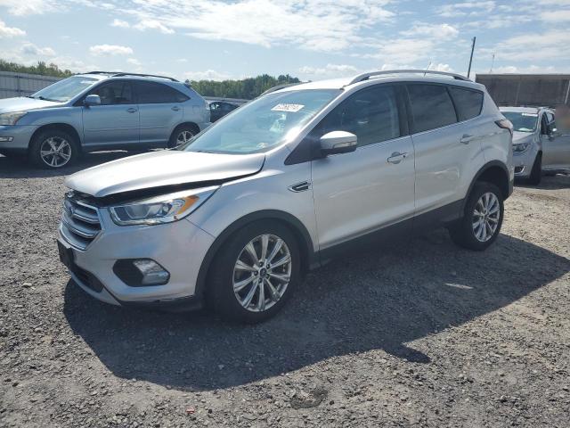 FORD ESCAPE TIT 2017 with VIN 1FMCU9J93HUF09356 - Photo from auction