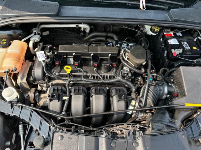 Photo 7 from auction – 2014 FORD FOCUS SE with VIN 1FADP3F20EL434308