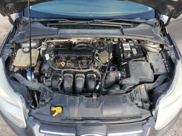 Photo 11 from auction – 2013 FORD FOCUS SE with VIN 1FADP3K22DL331881