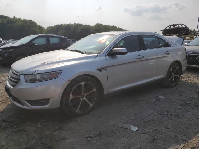 FORD TAURUS SEL 2014 with VIN 1FAHP2E8XEG184523 - Photo from auction