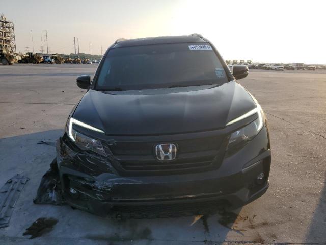 Photo 5 from auction – 2021 HONDA PILOT SE with VIN 5FNYF5H21MB004411
