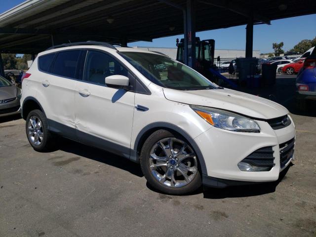 Foto 4 de la subasta – 2015 FORD ESCAPE SE con VIN 1FMCU9G91FUA44094