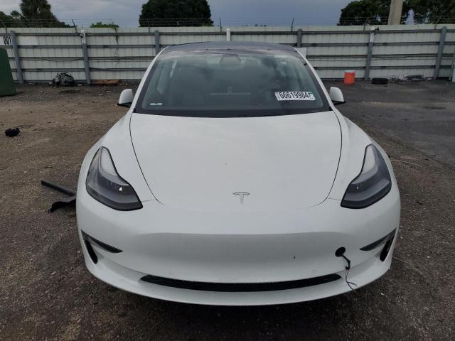 Photo 5 from auction – 2021 TESLA MODEL 3 with VIN 5YJ3E1EA6MF048647